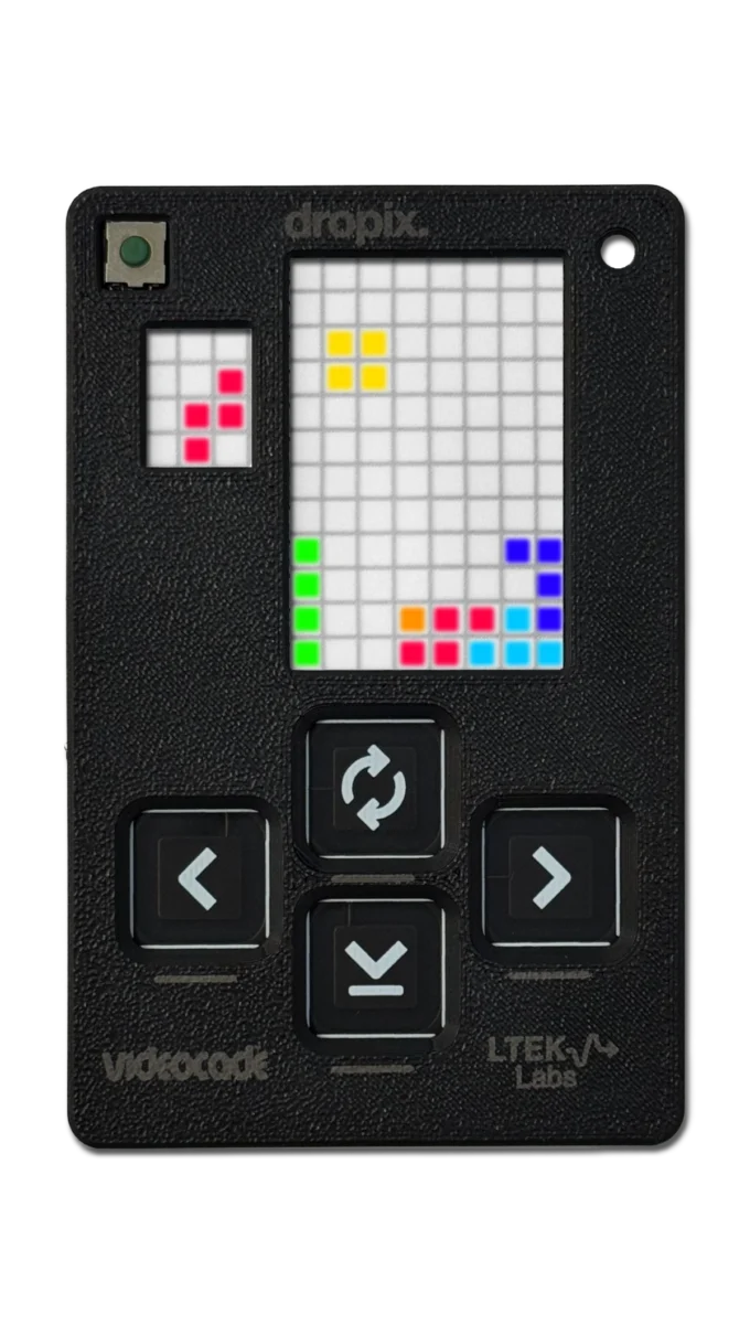VIDEOCADE dropix console, black shell with a four-way pad and coloured blocks stacked on the LED grid